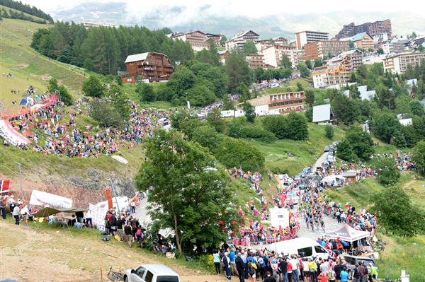 Riders approach the summit of L'Alpe d'Huez in stage 18 of the 2013 Tour de France