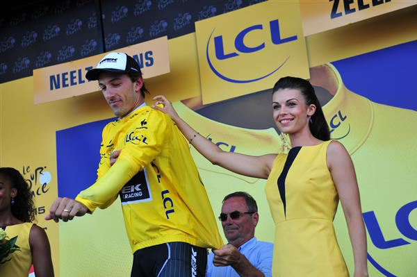 Bernard Hinault helps Fabian Cancellara with the yellow jersey